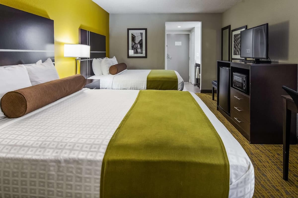 Premium bedding, desk, laptop workspace, soundproofing