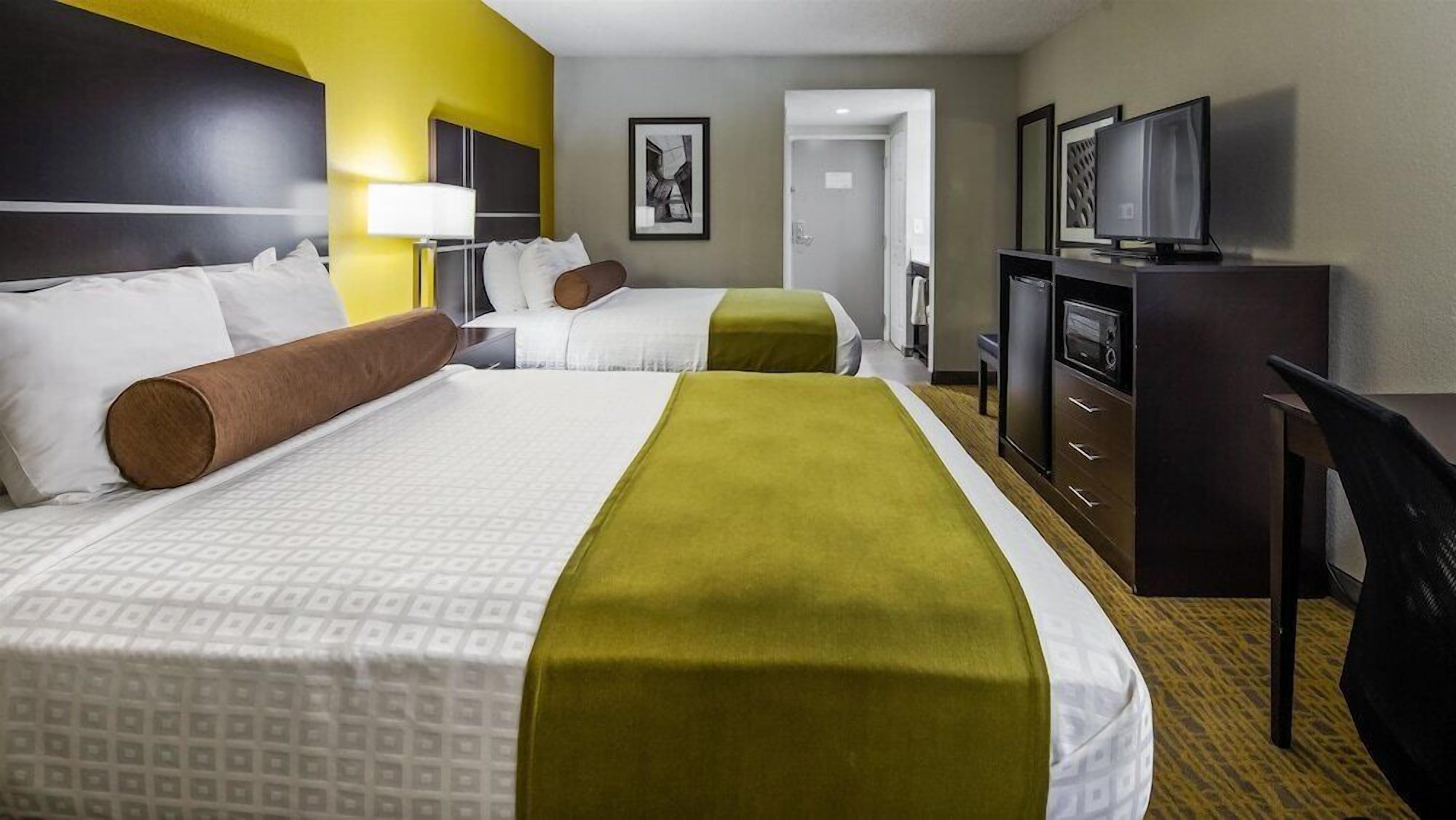 Premium bedding, desk, laptop workspace, soundproofing