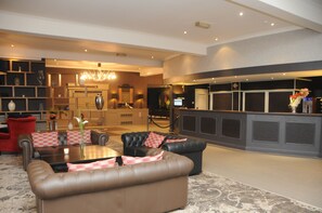 Coin salon dans le hall