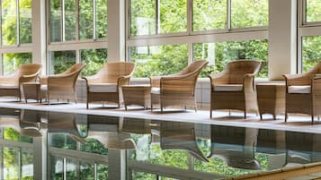 Indoor pool, outdoor pool, pool umbrellas, sun loungers