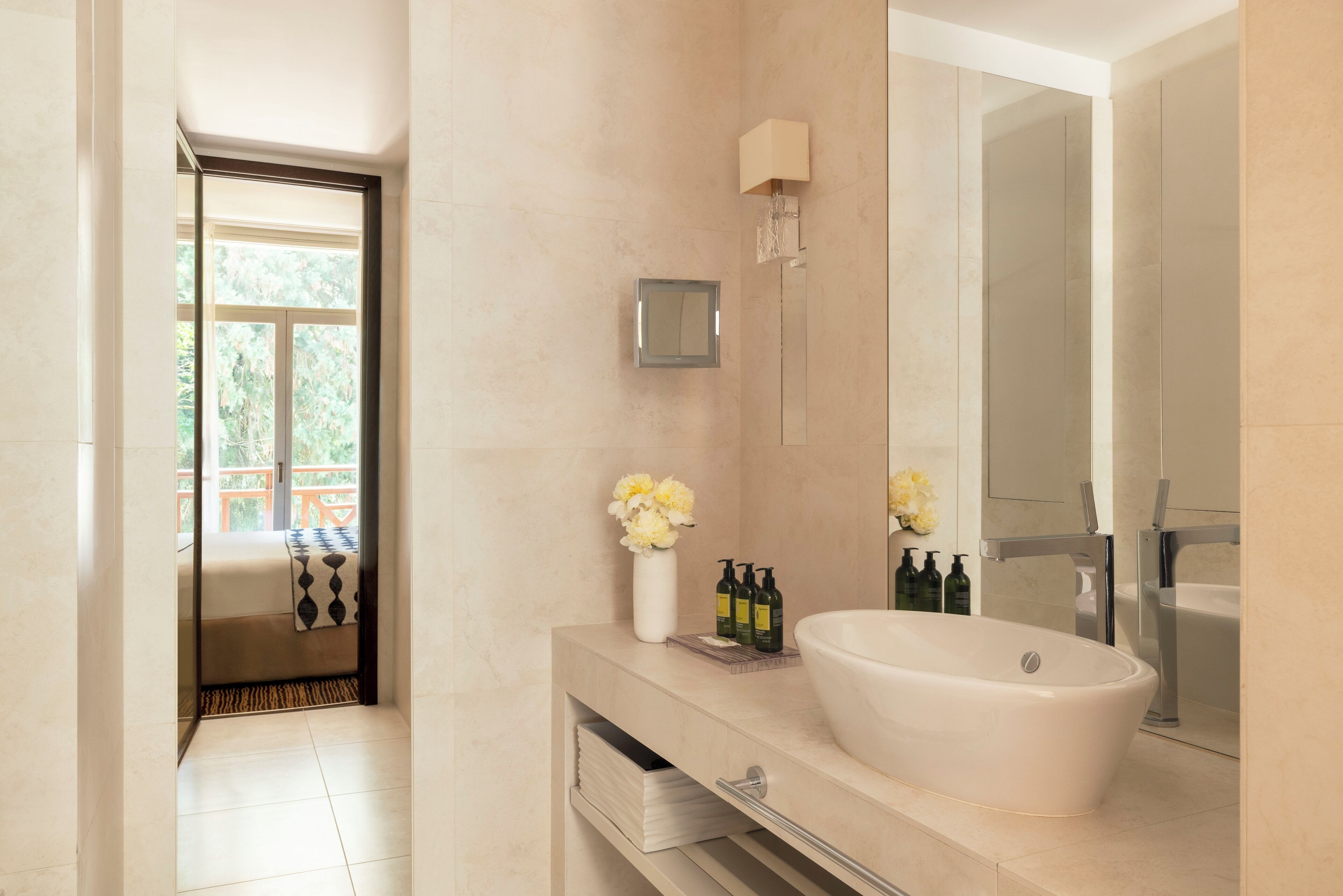 junior suite (south-facing) | bathroom | combined shower/bathtub, designer toiletries, hair dryer, bathrobes