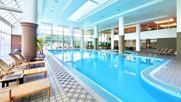 Indoor pool, seasonal outdoor pool, open 8 AM to 9:00 PM, sun loungers