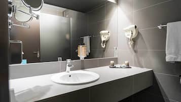 Eco-friendly toiletries, hair dryer, towels