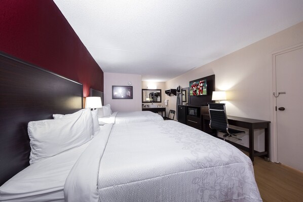 Deluxe Room, 2 Queen Beds (Smoke Free) | Desk, laptop workspace, blackout curtains, iron/ironing board