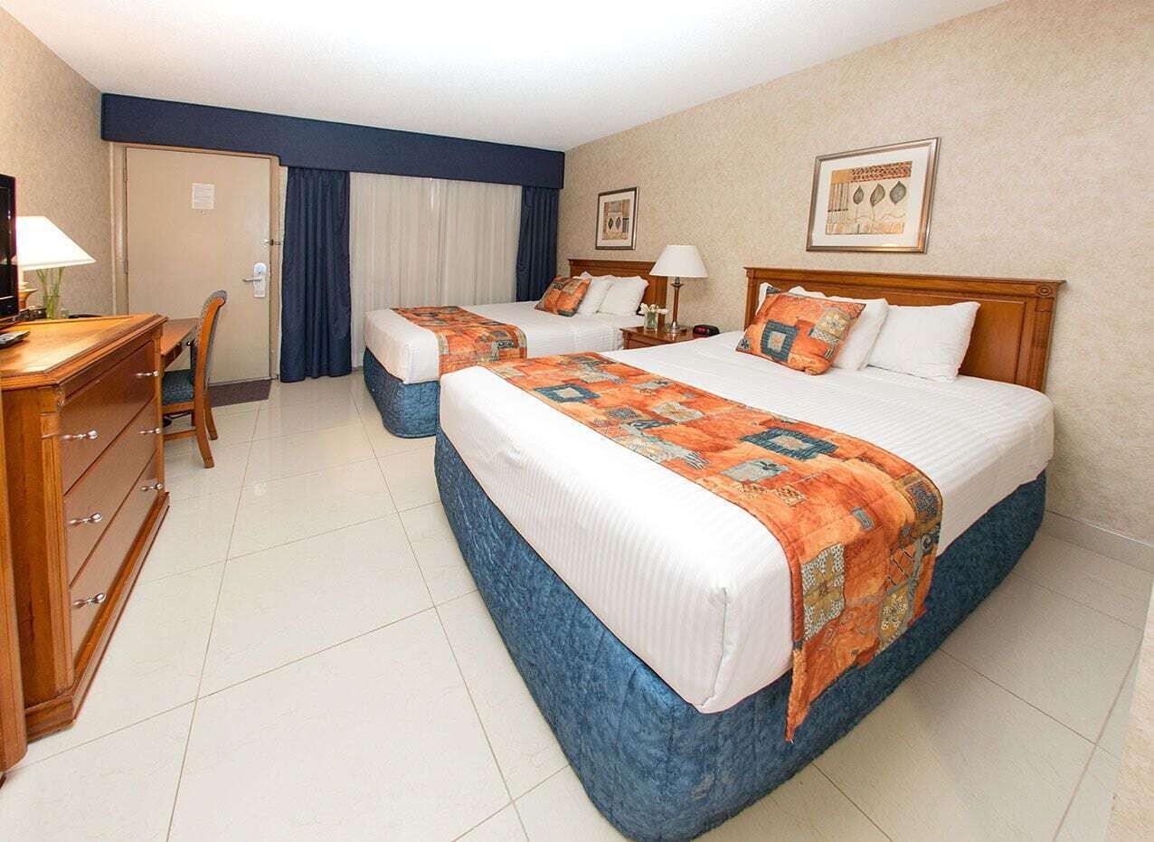 Premium bedding, Select Comfort beds, desk, blackout curtains