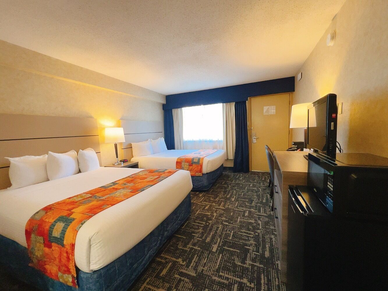 Standard Room, 2 Queen Beds | Premium bedding, Select Comfort beds, desk, blackout drapes