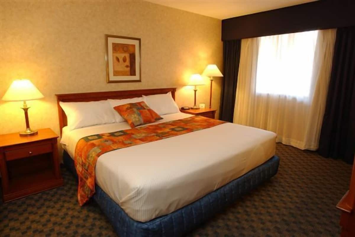 Premium bedding, Select Comfort beds, desk, blackout curtains