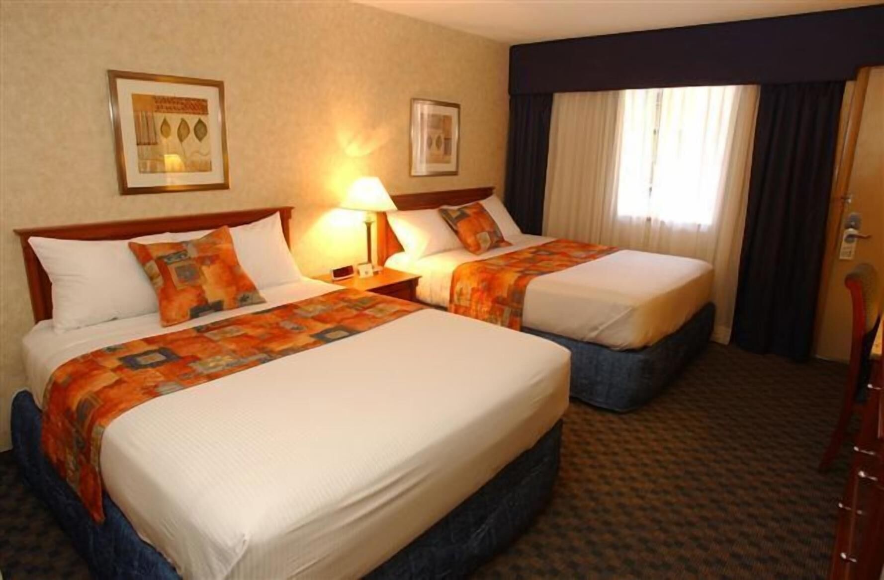 Premium bedding, Select Comfort beds, desk, blackout curtains