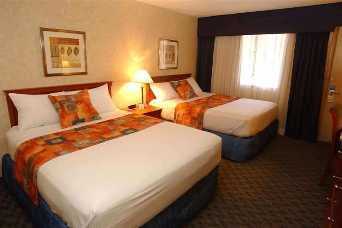 Premium bedding, Select Comfort beds, desk, blackout curtains