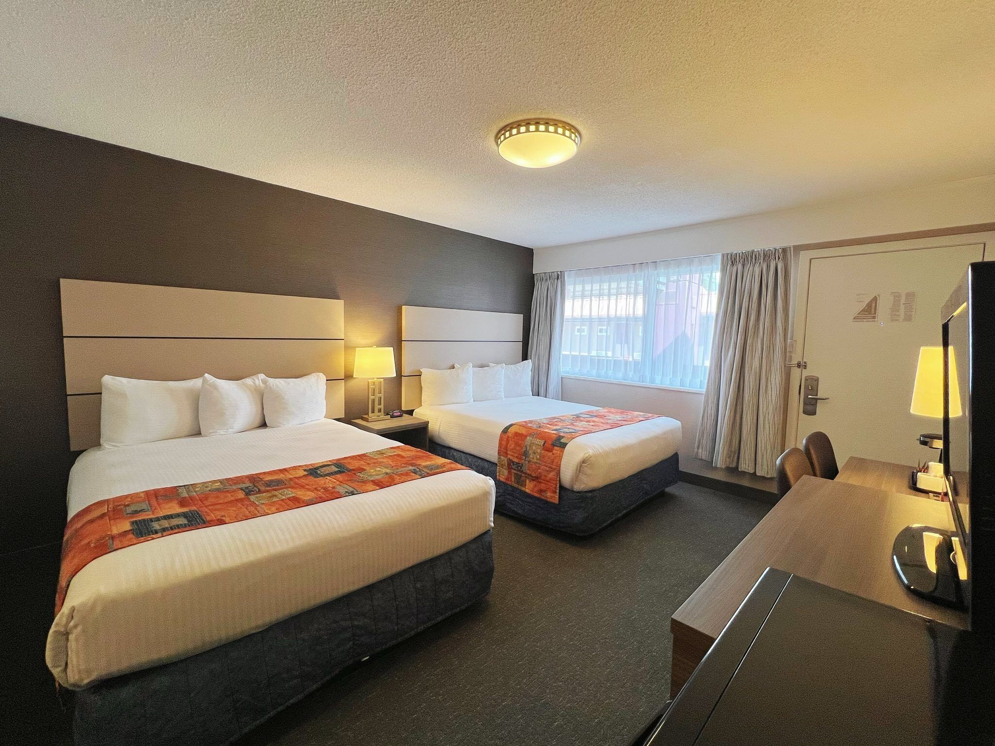 Deluxe Room, 2 Queen Beds | Premium bedding, Select Comfort beds, desk, blackout drapes