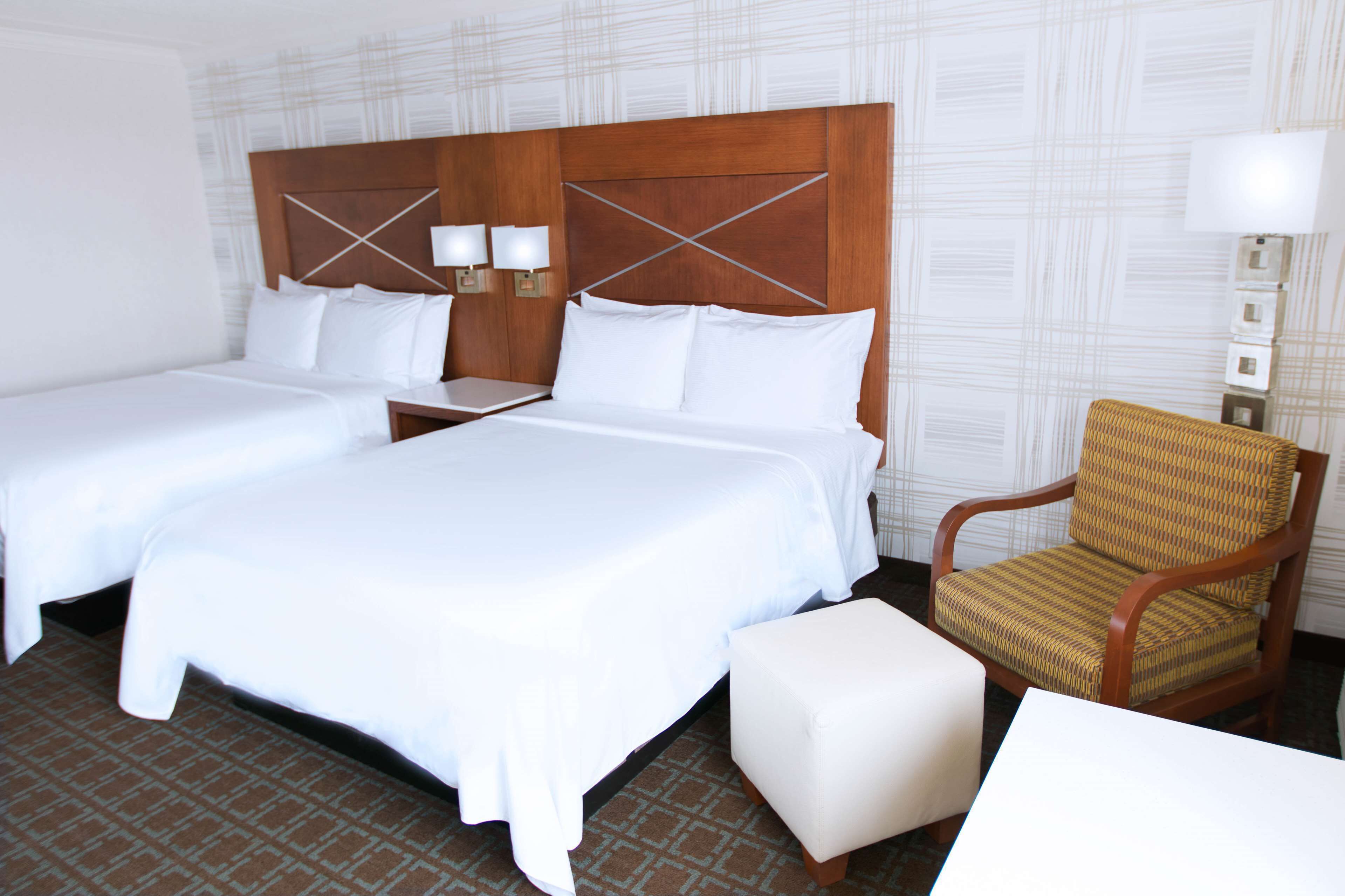 premium bedding, down duvets, pillow-top beds, in-room safe