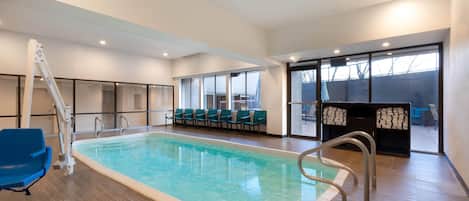 Indoor pool, open 9:00 AM to 10:00 PM, pool umbrellas, pool loungers