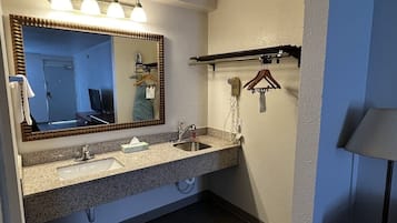 Combined shower/bathtub, deep-soaking bathtub, towels, soap