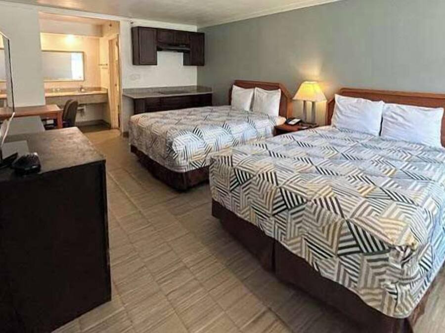 Premium bedding, pillowtop beds, blackout drapes, iron/ironing board