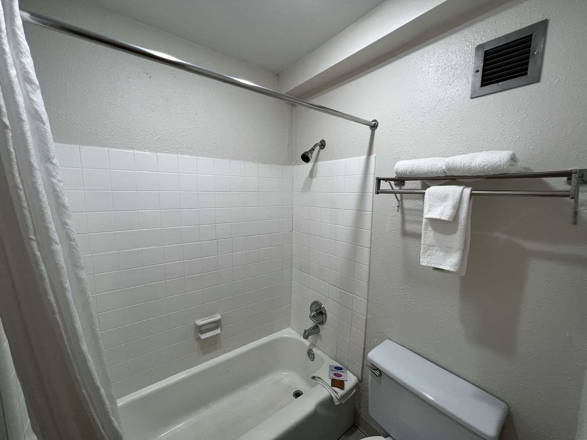 Combined shower/tub, deep soaking tub, towels, soap