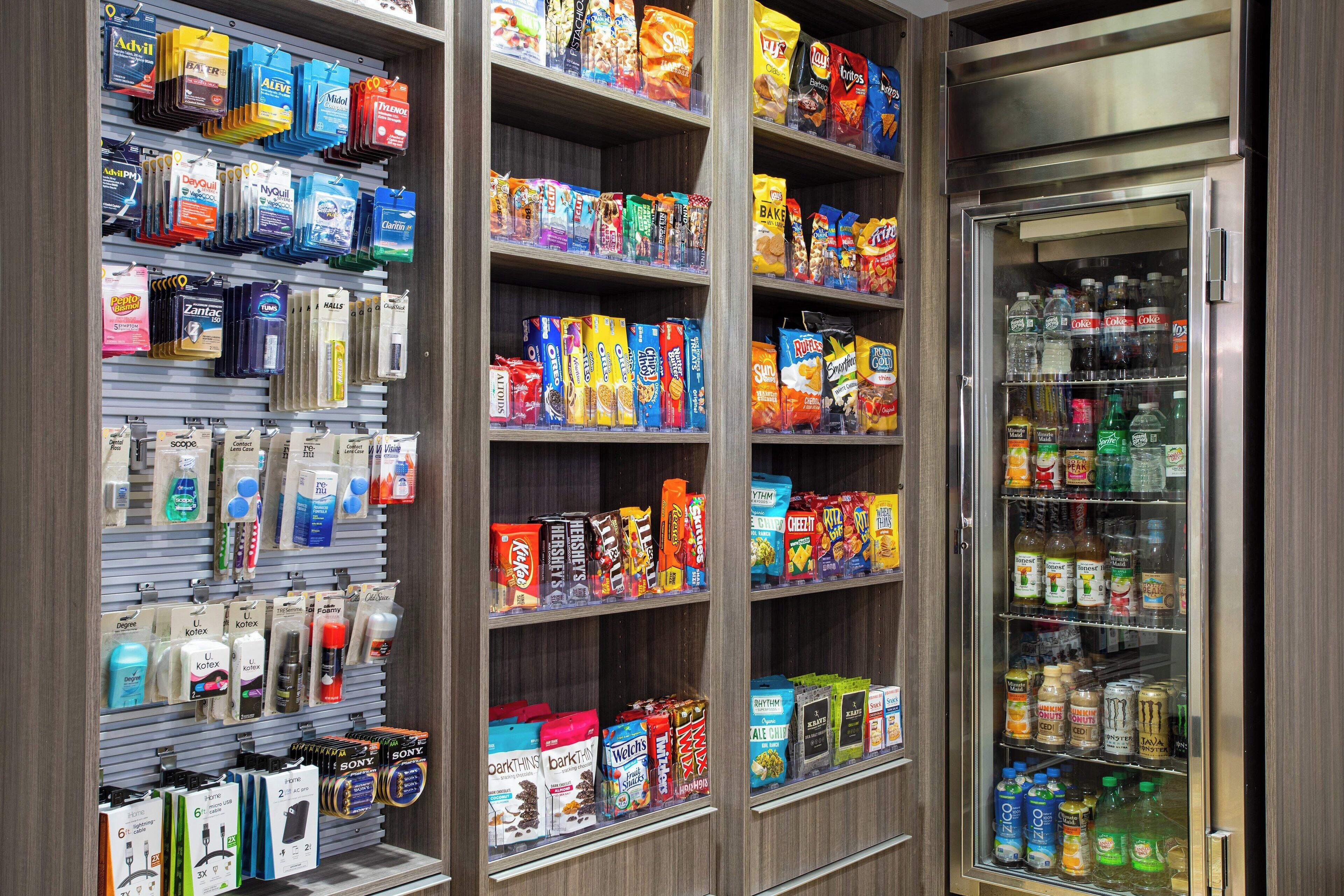 A snack and beverage display with various brands and products.