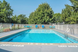 Seasonal outdoor pool, pool umbrellas, pool loungers