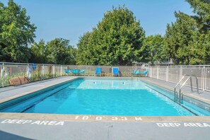 Seasonal outdoor pool, pool loungers