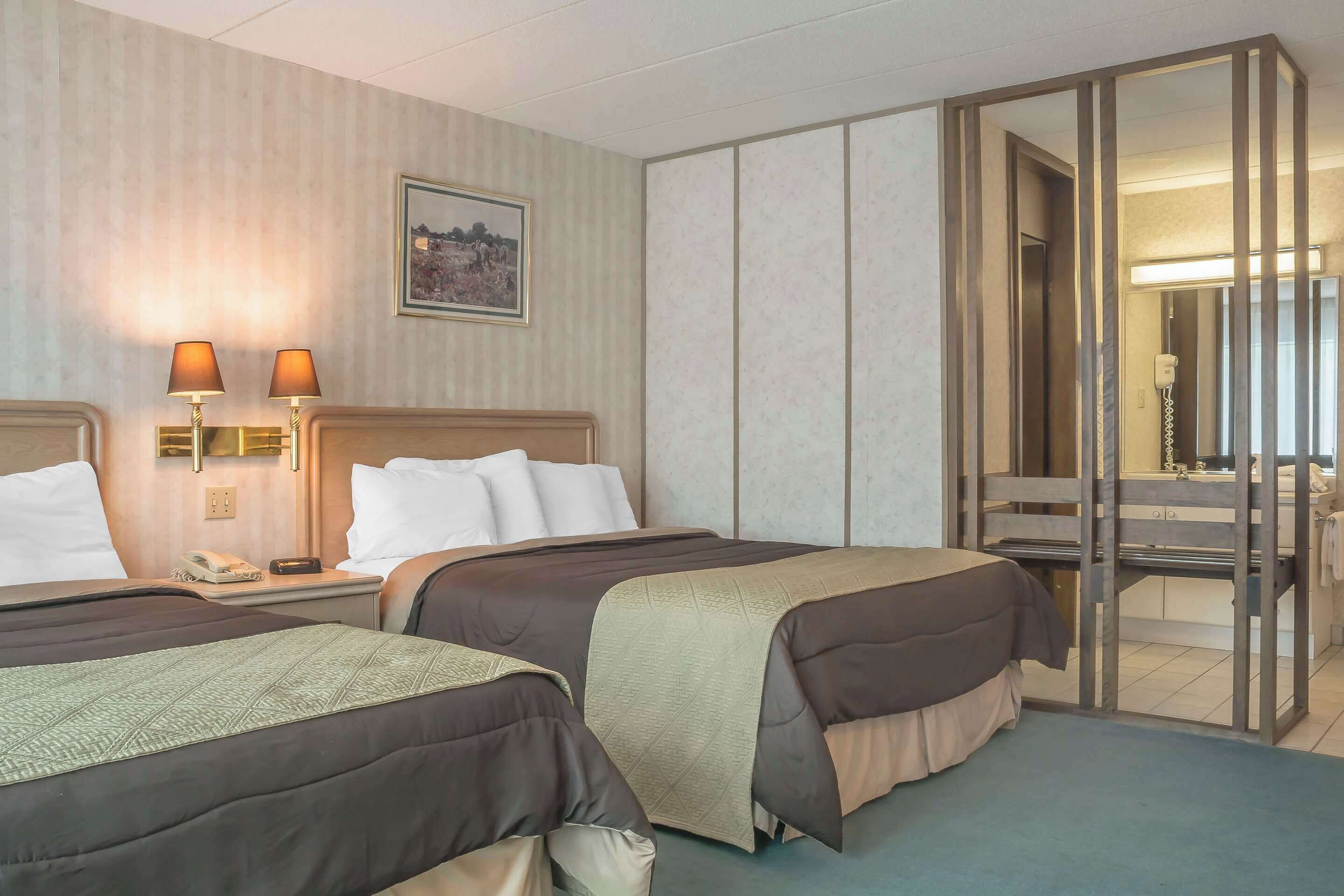 Standard Room, 2 Queen Beds, Non Smoking | Desk, laptop workspace, blackout drapes, iron/ironing board