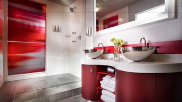 Designer toiletries, hair dryer, bathrobes, towels