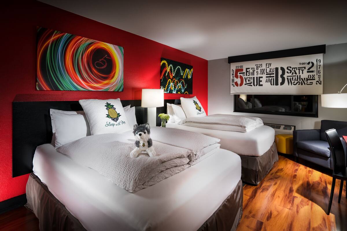 Premium bedding, down duvets, pillow-top beds, in-room safe
