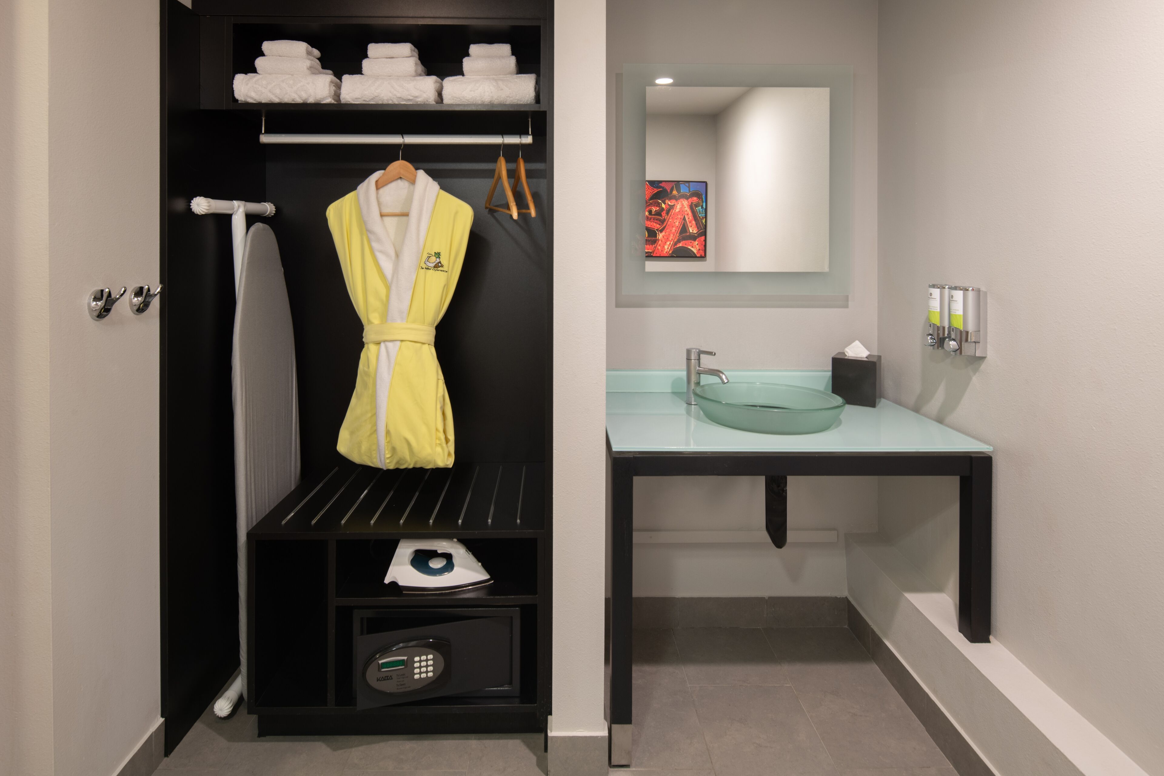 designer toiletries, hair dryer, bathrobes, towels