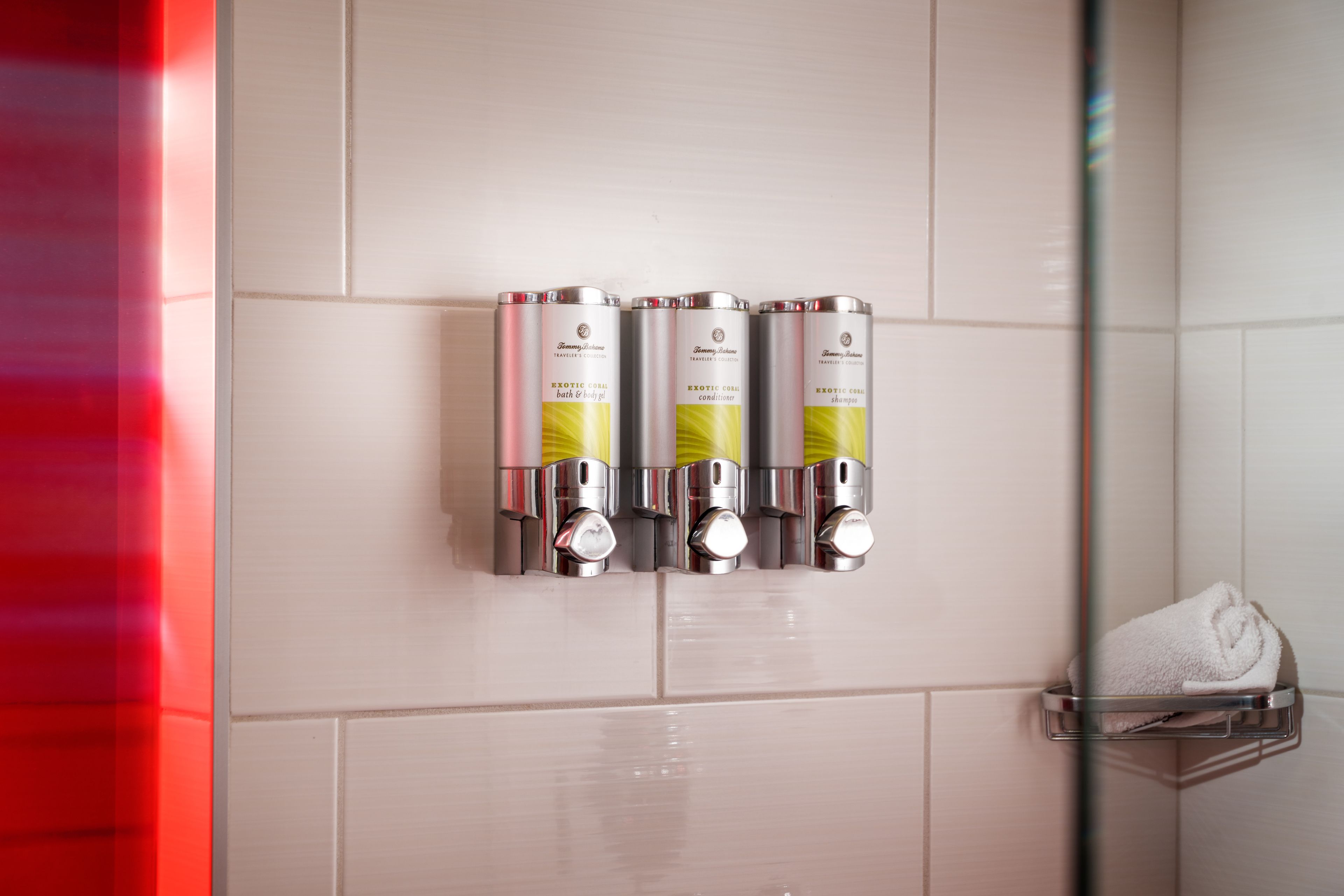 designer toiletries, hair dryer, bathrobes, towels