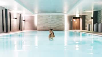 Indoor pool, open 7:00 AM to 8:00 PM, pool loungers