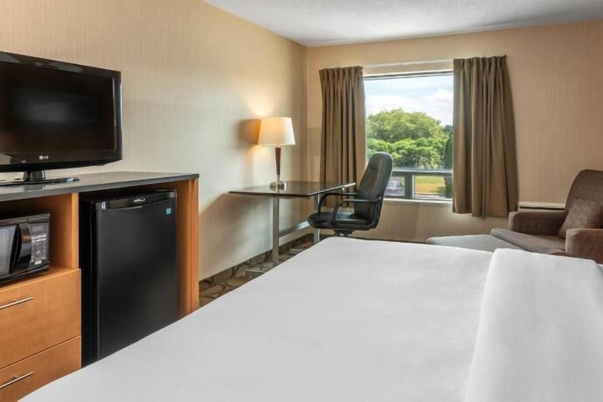 Premium bedding, pillow-top beds, desk, blackout curtains