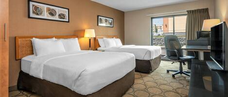 Premium bedding, pillowtop beds, desk, blackout drapes