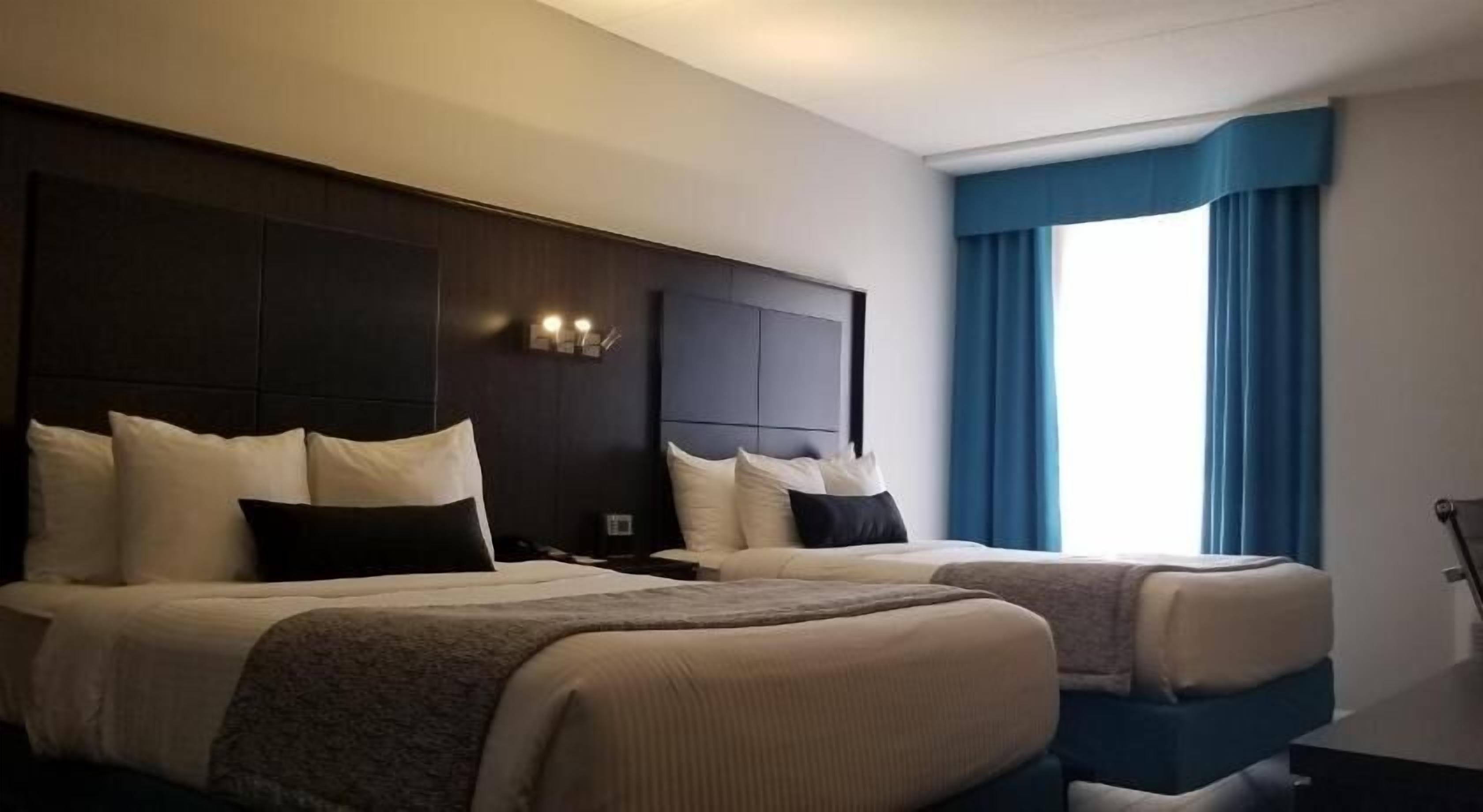 Select Comfort beds, blackout drapes, iron/ironing board