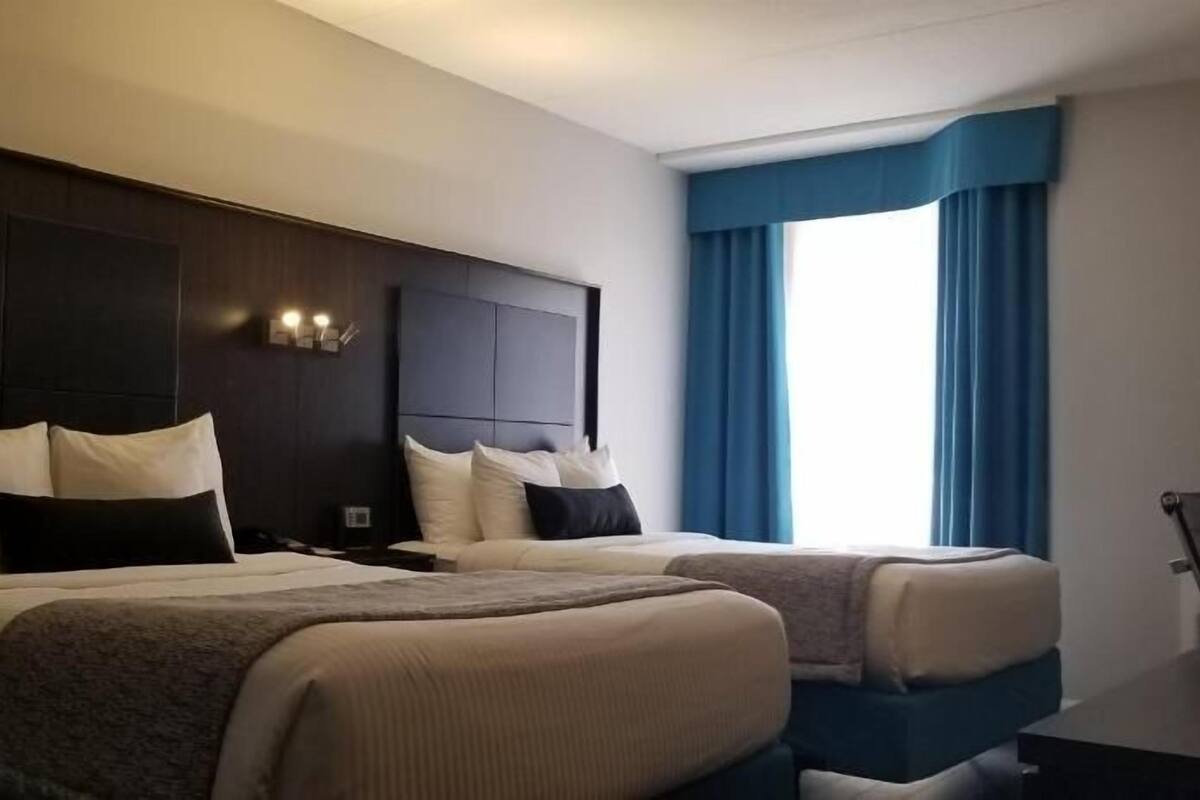 Select Comfort beds, blackout drapes, iron/ironing board