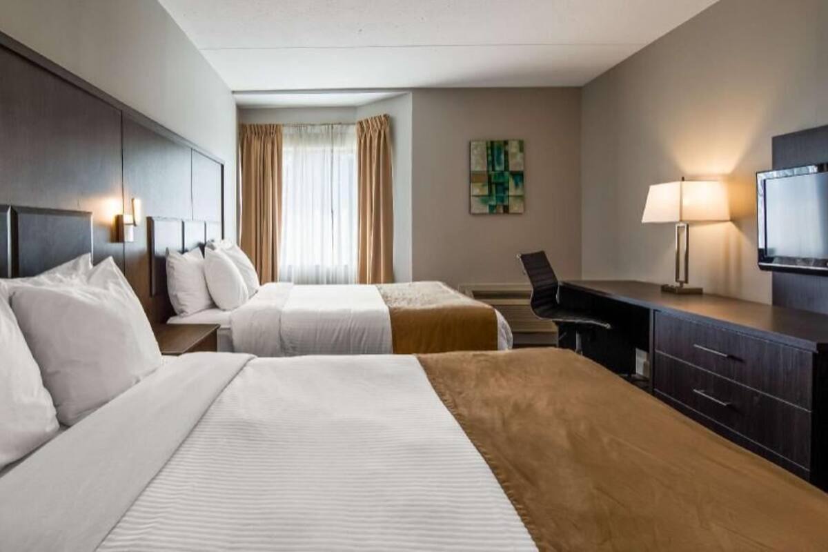 Select Comfort beds, blackout drapes, iron/ironing board