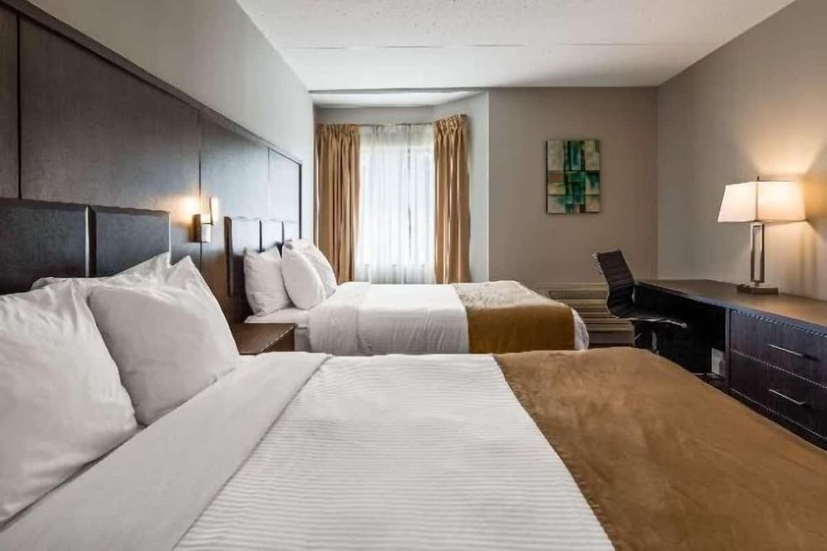 Select Comfort beds, blackout drapes, iron/ironing board