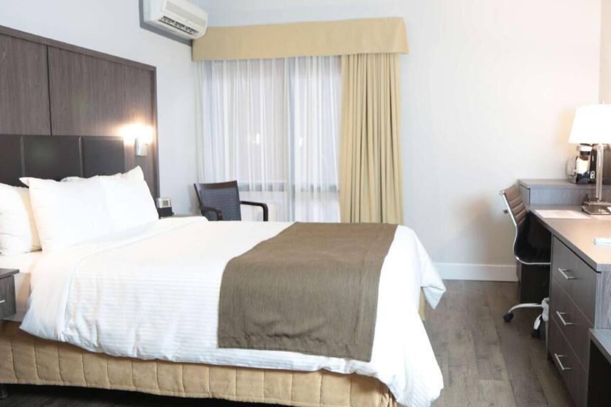 Select Comfort beds, blackout drapes, iron/ironing board