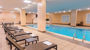Indoor pool, open 6:00 AM to 11:00 PM, pool umbrellas, sun loungers