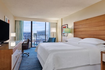 Premium bedding, down comforters, pillowtop beds, in-room safe at Sheraton Orlando Lake Buena Vista Resort