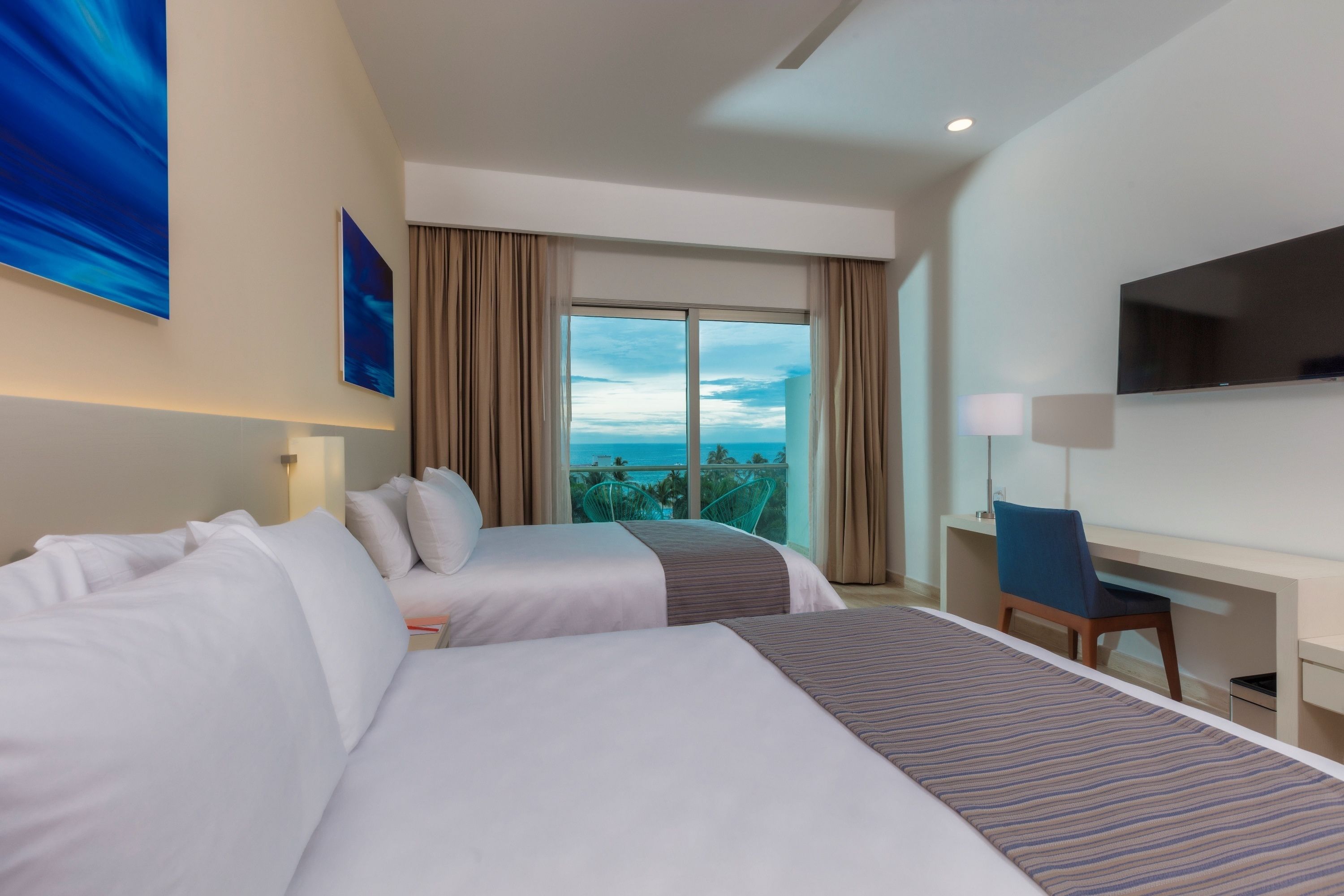 Habitación Deluxe, vista al mar | Vista a la playa o el mar