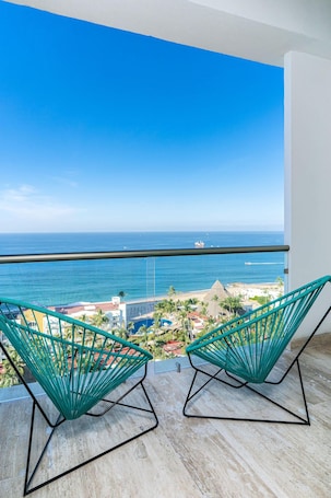 In-room safe, laptop workspace, blackout drapes, iron/ironing board. Krystal Vallarta