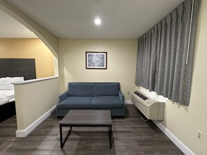 Desk, blackout drapes, soundproofing, iron/ironing board