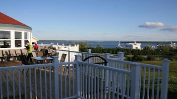 Enjoy dining or socializing on the deck with a view of the marina.