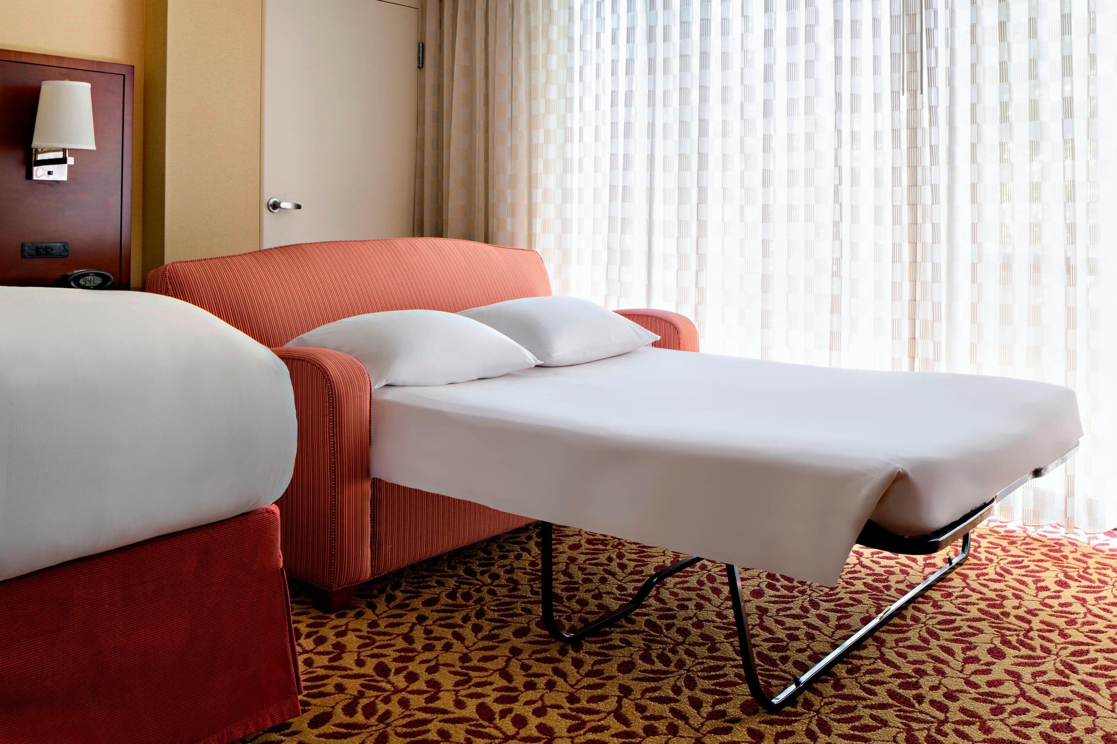 deluxe room, 1 king bed | premium bedding, pillow-top beds, in-room safe, desk