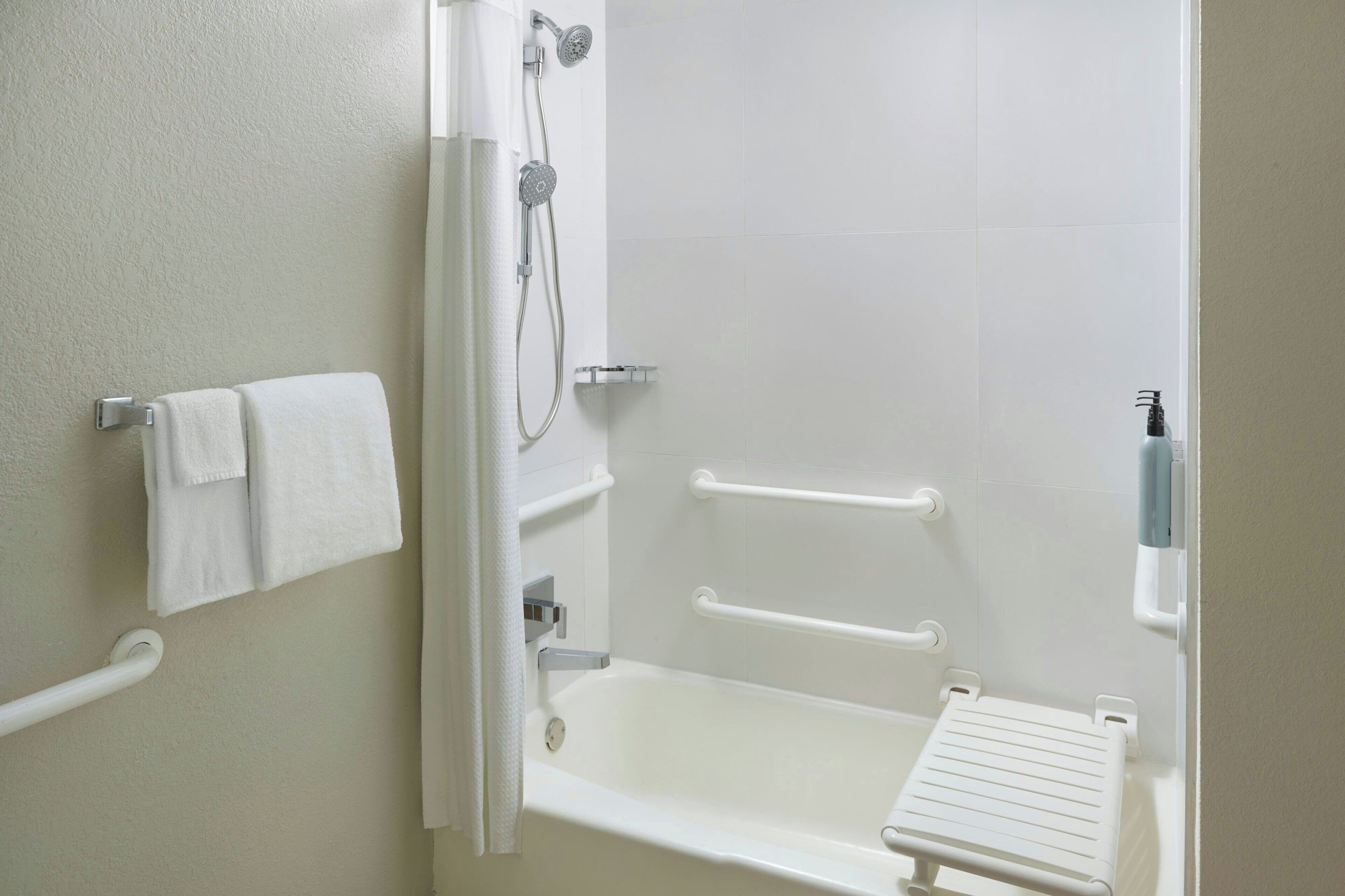 combined shower/bathtub, free toiletries, hair dryer, towels