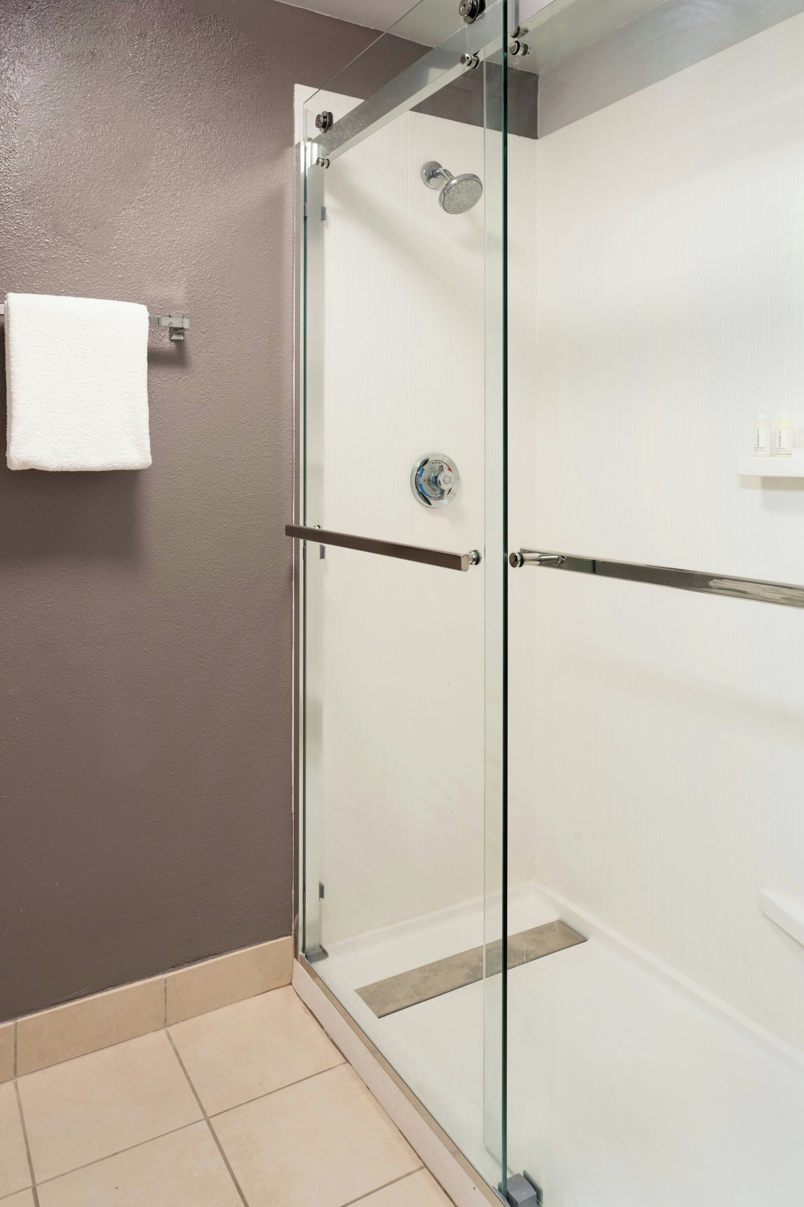 combined shower/bathtub, free toiletries, hair dryer, towels