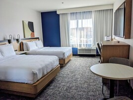 Studio, 2 Queen Beds | Desk, laptop workspace, blackout drapes, iron/ironing board