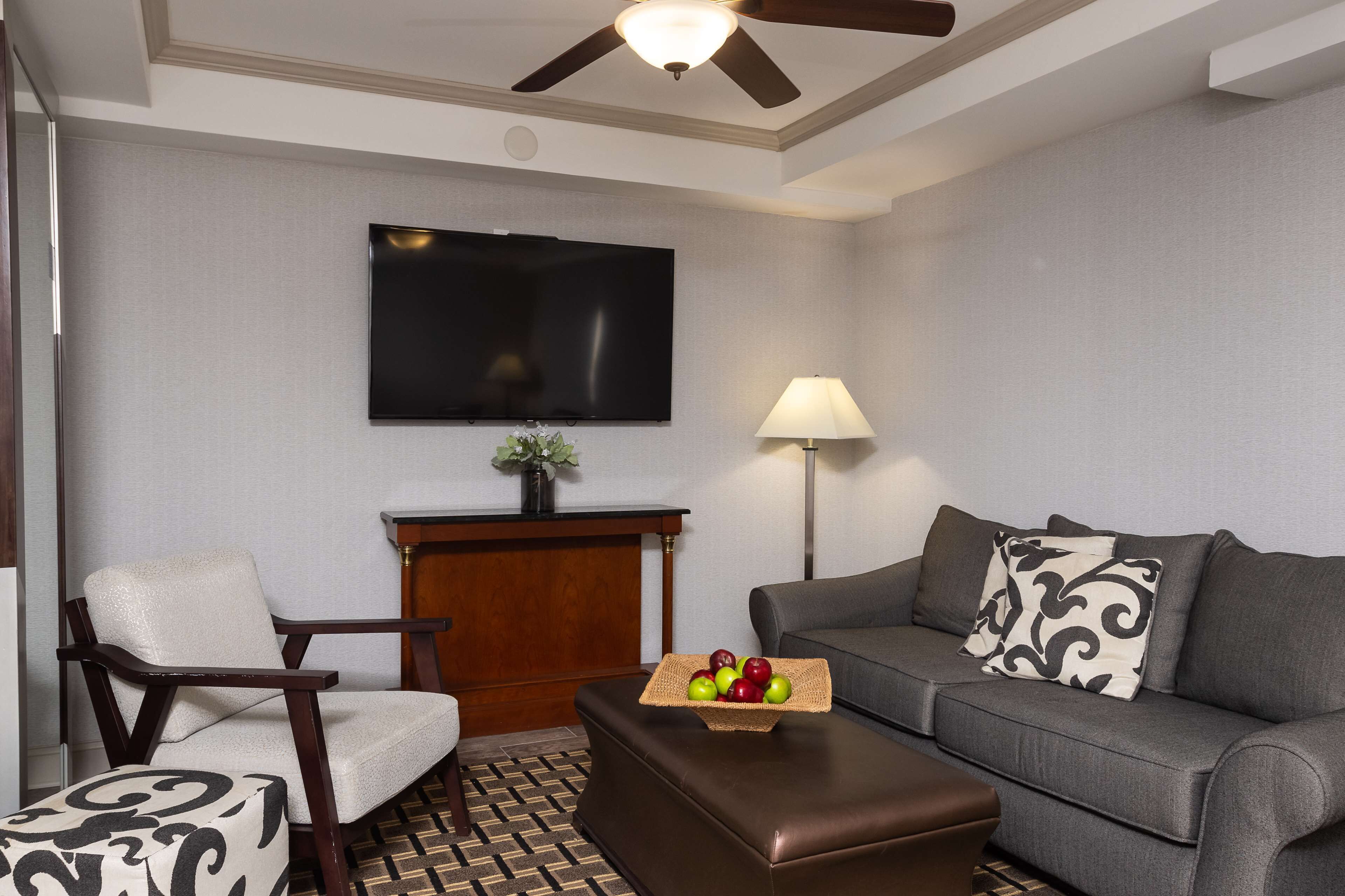 presidential suite, 2 queen beds, non smoking | living area | 42-inch lcd tv with cable channels, tv, mp3 dock