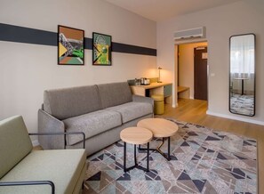Room, 1 King Bed with Sofa bed | Minibar, in-room safe, desk, laptop workspace