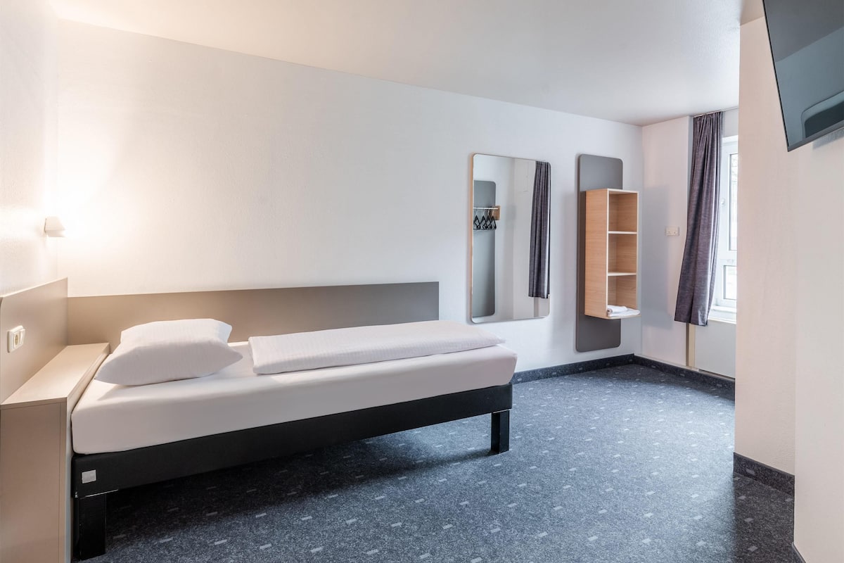 Habitación triple | 1 dormitorio, escritorio, cortinas opacas y sistema de insonorización