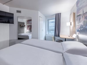 Habitación doble | 1 dormitorio, escritorio, cortinas opacas y sistema de insonorización