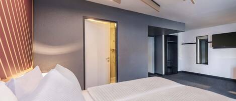 Desk, blackout drapes, soundproofing, free WiFi